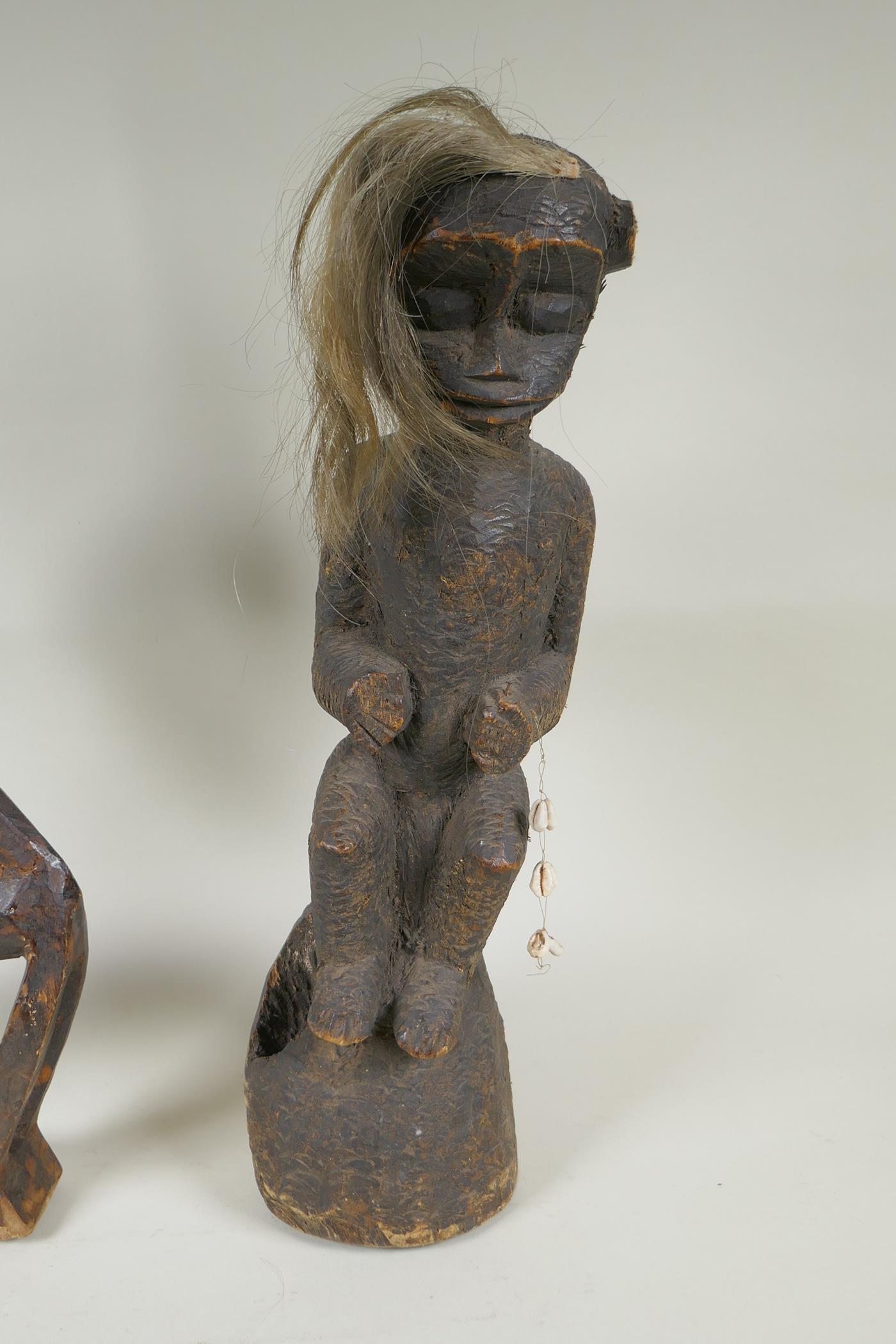 An African Bamana tribe carved wood Chi Wara antelope, together with a carved wood figure with - Image 4 of 4