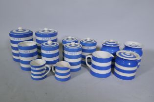 A quantity of Cornish ware pottery, three T&G Green jars and covers and a milk jug, the remainder by
