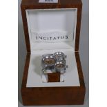 An Incitatus Oulm three dial watch on leather strap, in box