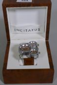 An Incitatus Oulm three dial watch on leather strap, in box