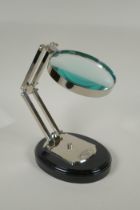 An adjustable desk top magnifying glass
