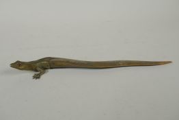 A brass mounted horn letter opener in the form of a lizard, 26cm long