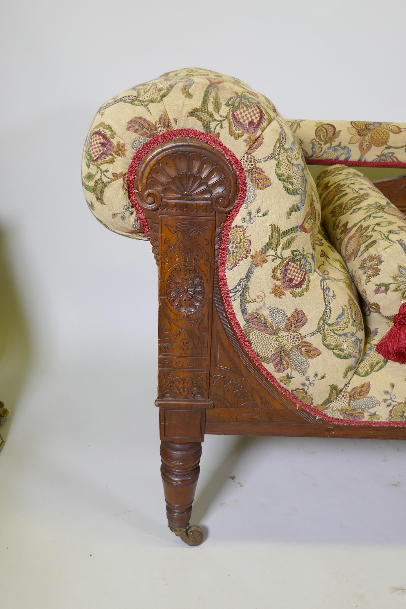 A Victorian walnut chaise longue with carved Grecian style decoration and good upholstery, 180cm - Image 3 of 4