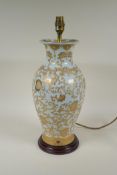 A porcelain vase with gilt Oriental scrolling floral decoration, converted to a table lamp, 45cm