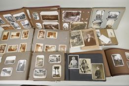 A quantity of C19th and early C20th photograph albums of social historical interest, including mid