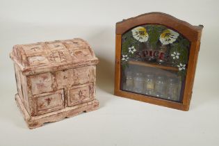 A painted and distressed wood jewellery chest with metal straps, and a hanging glass fronted spice
