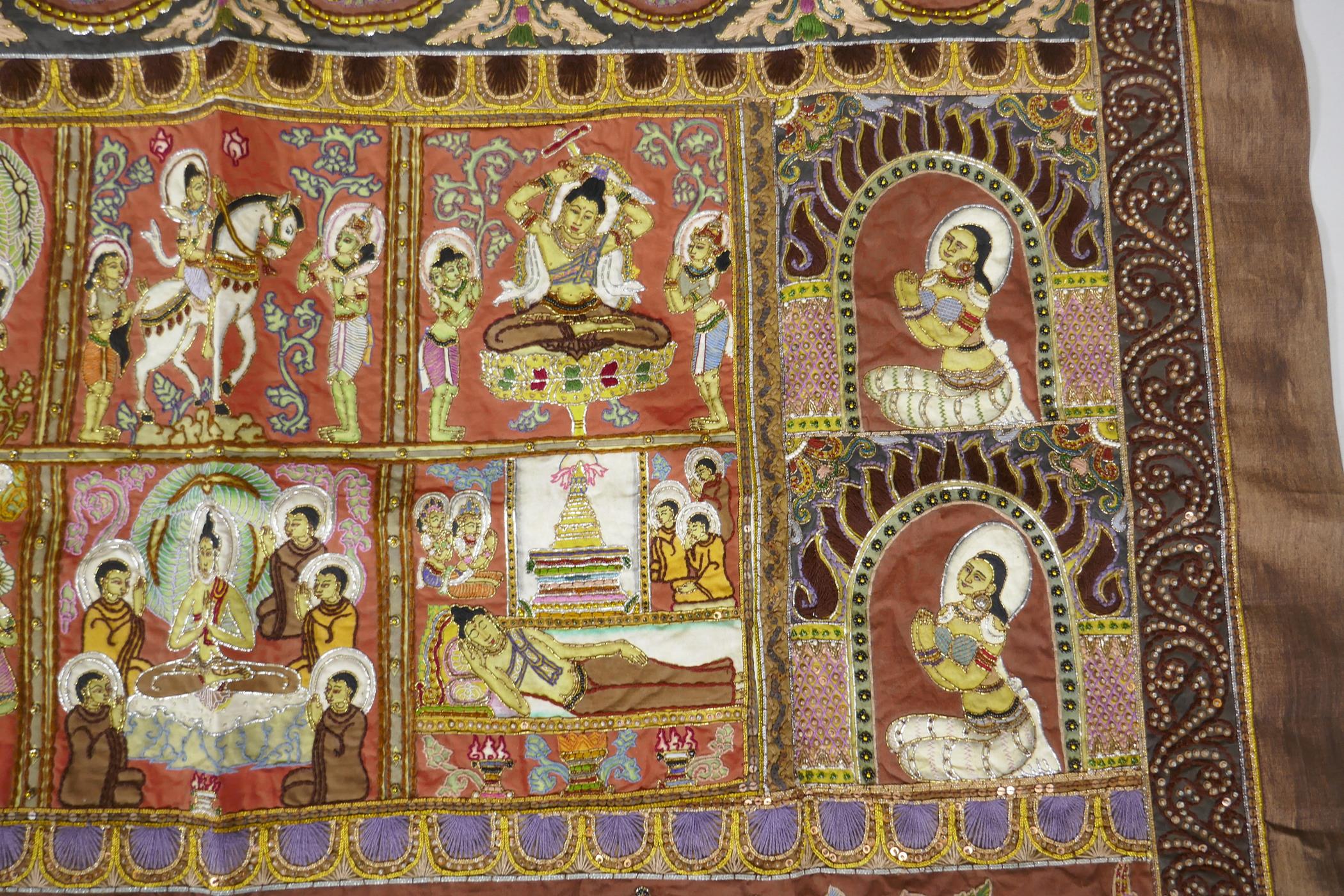 An antique Tibetan embroidered and beaded silk textile hanging, decorated with depictions of Buddha, - Image 4 of 8