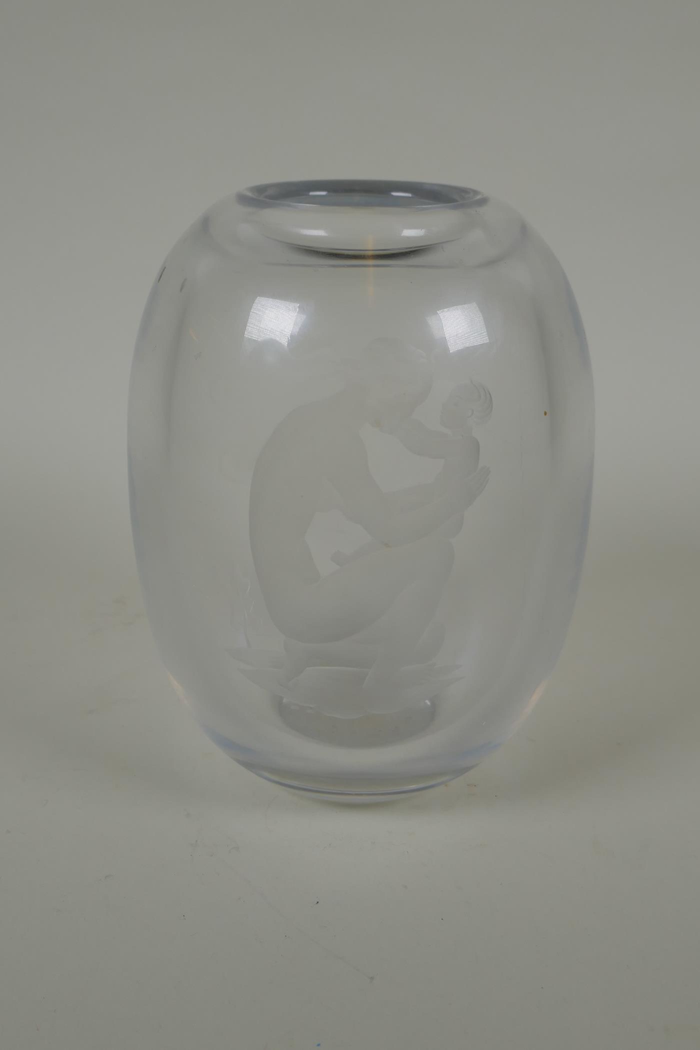 An Art Deco glass vase with etched intaglio mother and child, possibly Vicke Lindstrand for