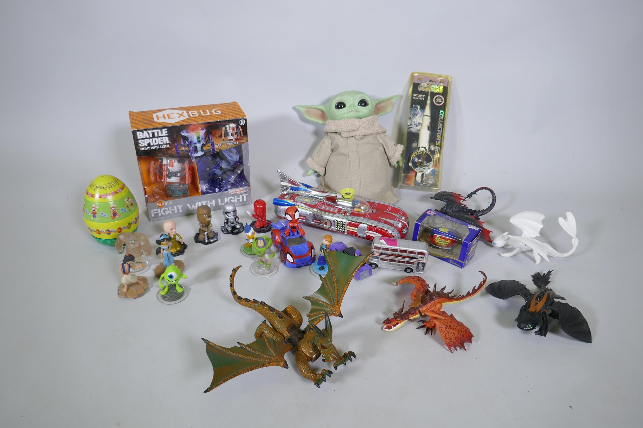 A quantity of Star Wars and Disney figures, toys etc