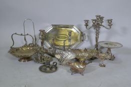 A quantity of silver plated wares, an Edwardian serving tray, Sheffield candlesticks, etc