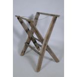 A rustic weathered wood baggage stand, 70cm high