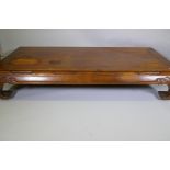 An antique Chinese hardwood low/opium table, 190 x 84cm