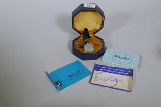 A vintage Bulova gold plated gentleman's wristwatch, original box and paperwork, purchased 1971