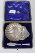 A hallmarked silver shell shaped butter dish and knife in a presentation box, Birmingham circa 1900,