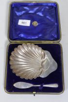 A hallmarked silver shell shaped butter dish and knife in a presentation box, Birmingham circa 1900,