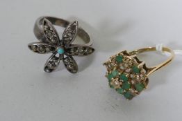 A 9ct gold cluster ring set with emeralds and diamonds, 3.3g gross, size P, AF missing one stone,