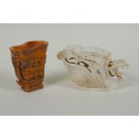A Chinese moulded glass libation cup in the form of a phoenix, and a carved bone libation cup with