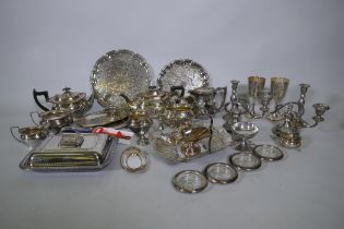 A quantity of silver plate to include tea sets, serving trays, coasters, goblets etc