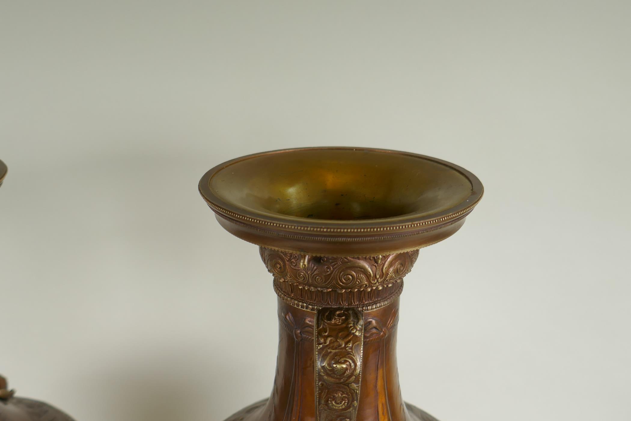 After Barbedienne, a pair of bronze Grand Tour style urns with two handles and raised figural - Image 7 of 9