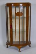1930s walnut demi lune display cabinet, raised on cabriole supports, 65 x 34 x 118cm