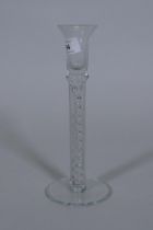 A Georgian style glass candlestick with air twist stem, 25cm high