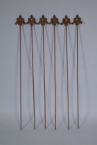 A set of six cast iron gothic style plant stakes, 106cm long