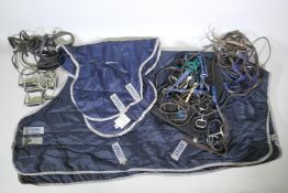 A quantity of equestrian equipment including Amigo Horseware stable/under blanket, Equigel saddle