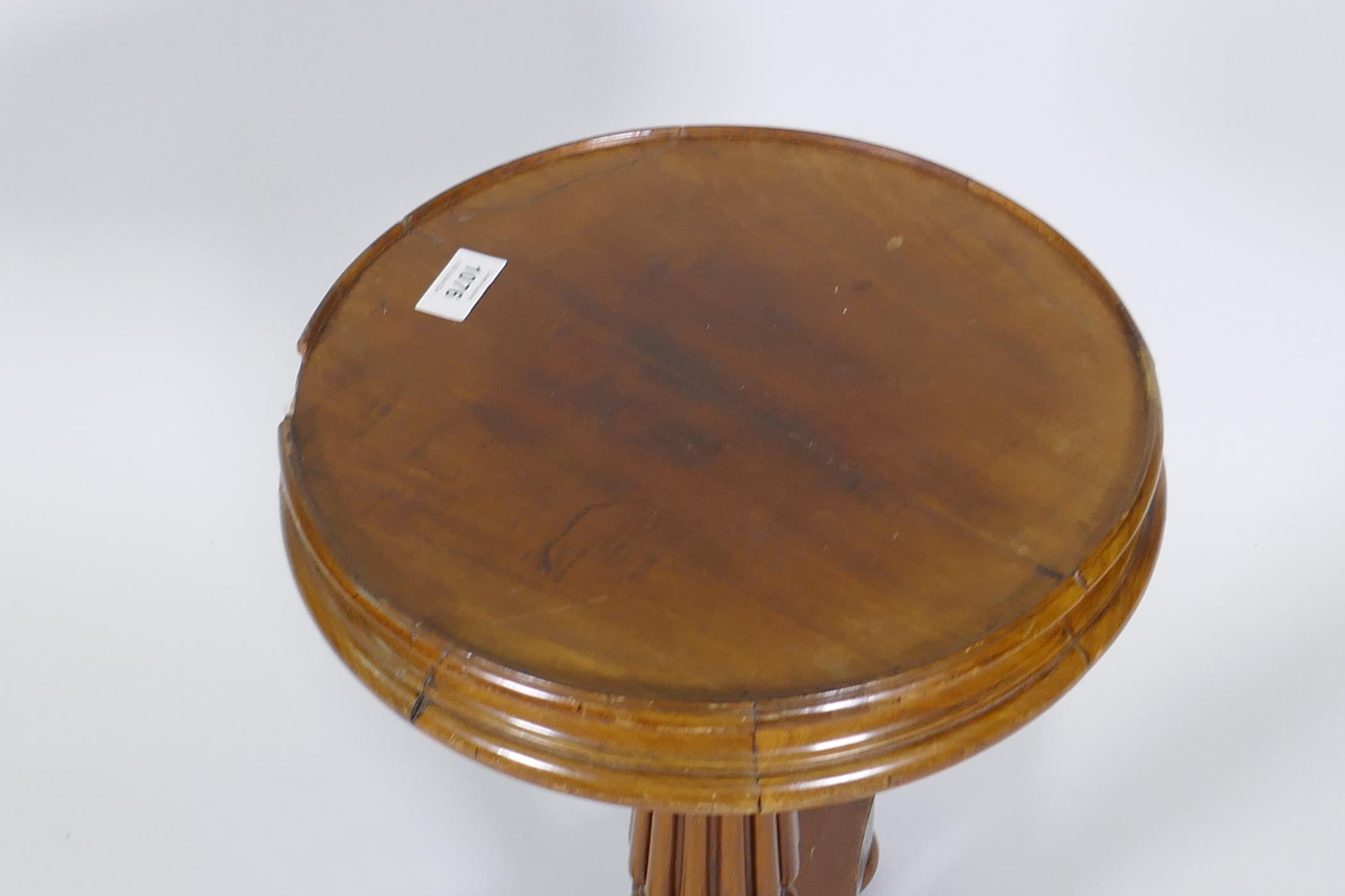 A C19th mahogany wine table, raised on Gillow style reeded column and platform base with bun - Image 2 of 3