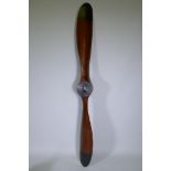 A decorative wooden propeller, 196cm long