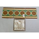 A Wedgwood Etruria tile with Japanese decoration and three Minton tiles with designs after Pugin, 15