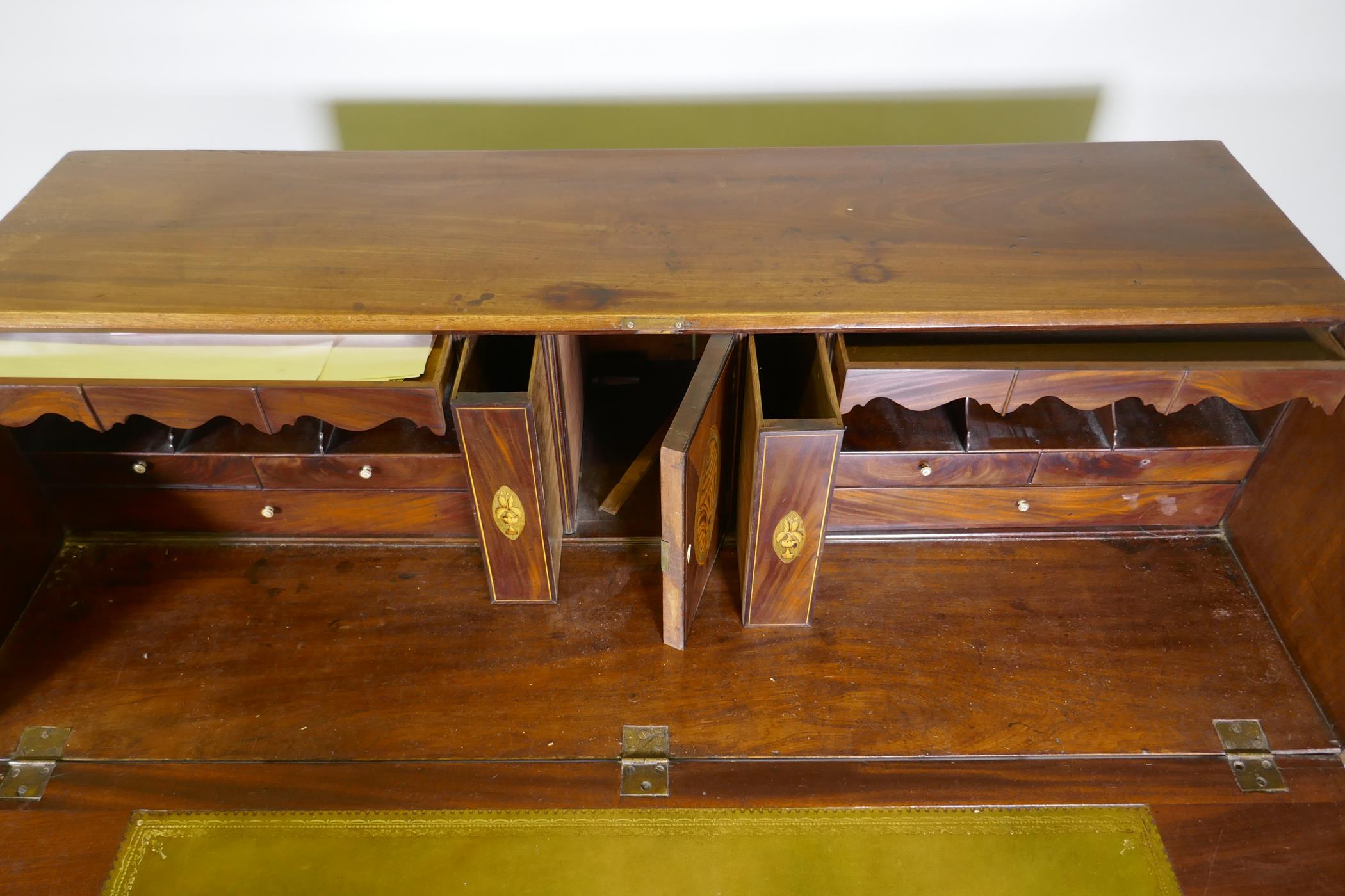 A Georgian mahogany bureau, the fall front with inset leather opening to reveal a fitted interior - Image 5 of 7