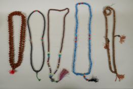 Five strings of Mala beads, including Rudraksha beads, glass beads, coral beads, wood beads etc,