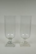 A pair of cut glass hurricane lamps/vases, 40cm high