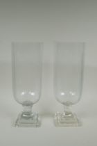 A pair of cut glass hurricane lamps/vases, 40cm high