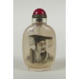 A Chinese reverse decorated glass snuff bottle with a portrait of an immortal, character