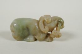 A Chinese nephrite jade carving of a ram, 9cm long