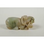 A Chinese nephrite jade carving of a ram, 9cm long