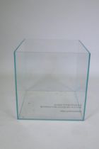 A glass display plinth/planter, formerly used by McLaren Racing, 48 x 48cm, 50cm high