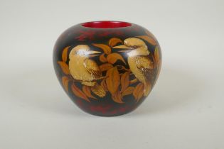 A mid century Australian turned wood vase/pot with painted pokerwork style decoration of two