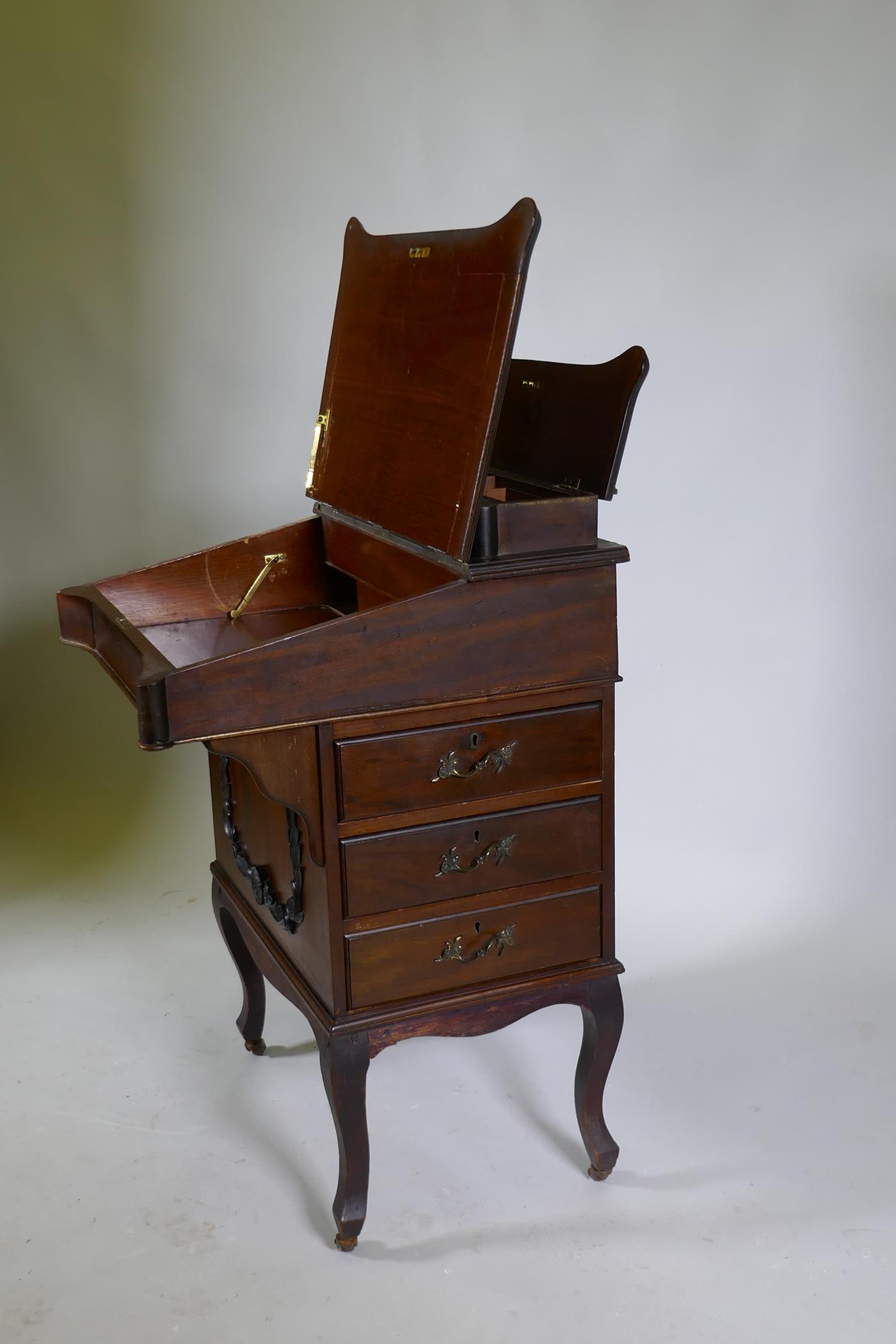 A Victorian mahogany Davenport, lift up top with fitted interior, fall front and three true and - Image 4 of 6