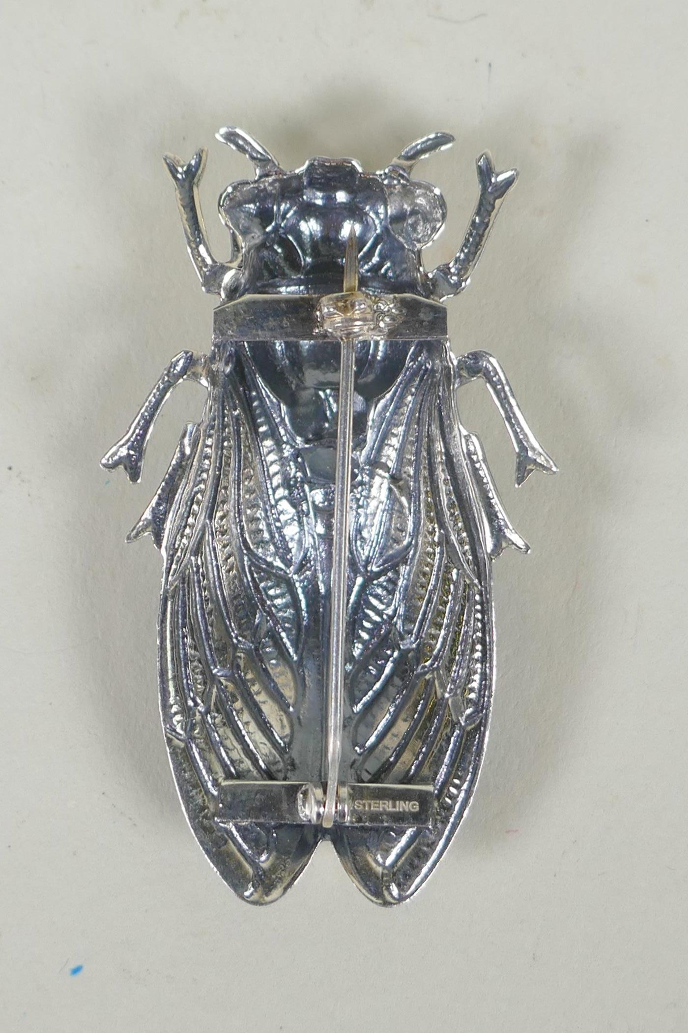 A sterling silver and enamel brooch in the form of a cicada, 5cm - Image 2 of 2