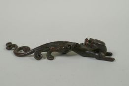 A Chinese bronze kylin, mark to base, 16cm