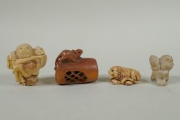 A Japanese carved boxwood rat netsuke, together with two carved tagua nut netsuke in the form of a
