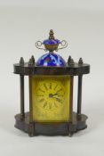 A brass cased mantel clock decorated with a cloisonne urn mount, 20cm high