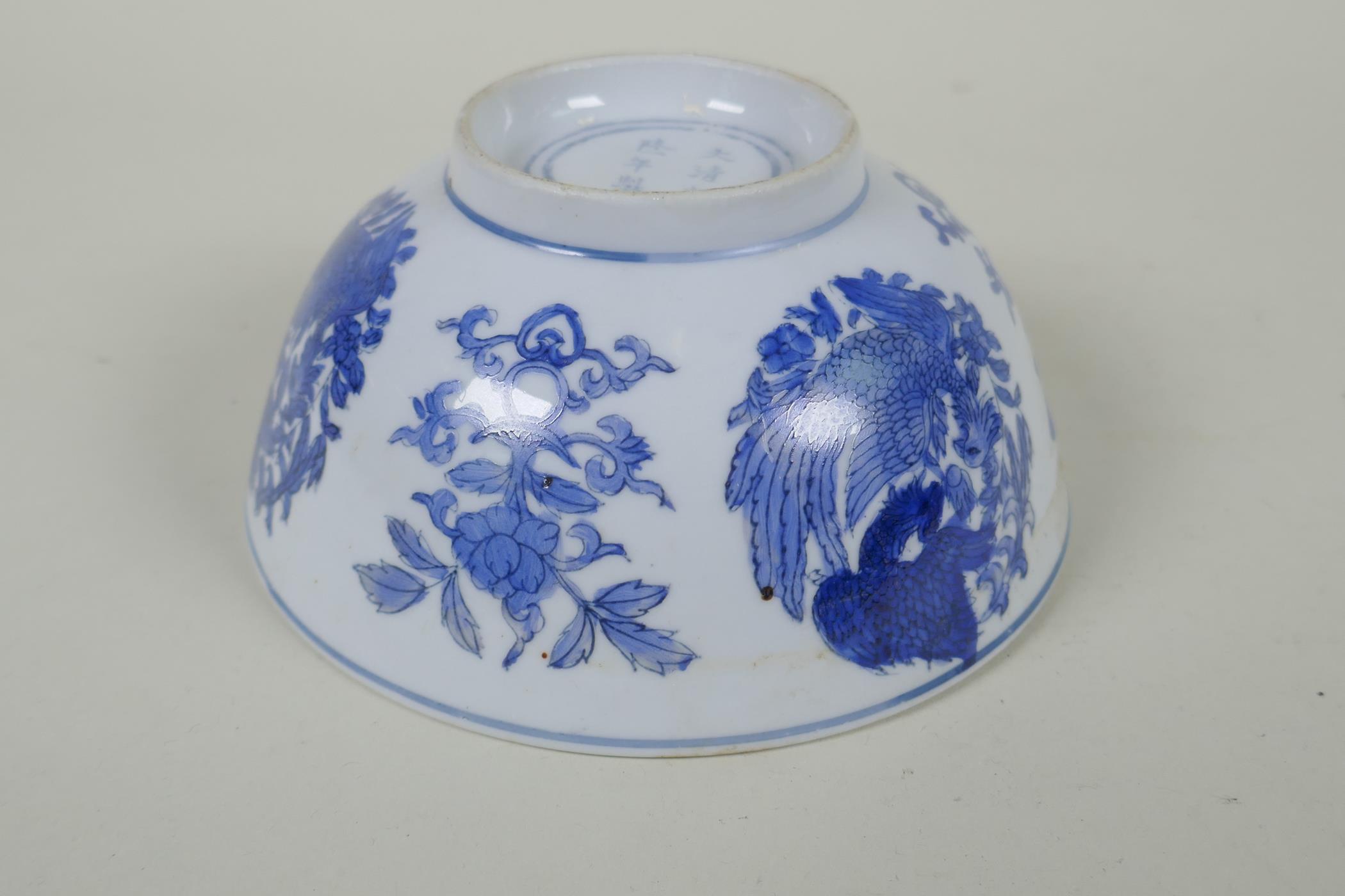 A Chinese blue and white porcelain bowl with phoenix and floral decoration, Qianlong 6 character - Image 5 of 6