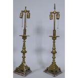 A pair of Continental style brass table lamps, 73cm high