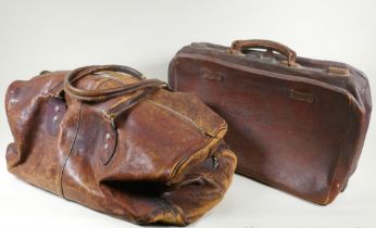 A vintage leather holdall, together with a smaller suitase