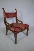 An C18th/C19th Italian carved walnut and parcel gilt side chair, raised on hoof feet