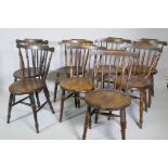 A harlequin set of eight Victorian penny kitchen chairs with spindle backs