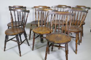 A harlequin set of eight Victorian penny kitchen chairs with spindle backs